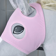 A close-up of a grey plush horse toy wearing the Hobby Horse LarDen "Horse Mask without ears Pink," a washable mask with an embroidered eye and ear openings. Wooden panels are visible in the background.