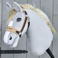 The Hobby Horse LarDen "Fur Halter LarDen Brown" features plush light gray fur, a cream mane, tan and brown halter with a soft fleece noseband, embroidered eyes, and a friendly expression, set against a wooden background.